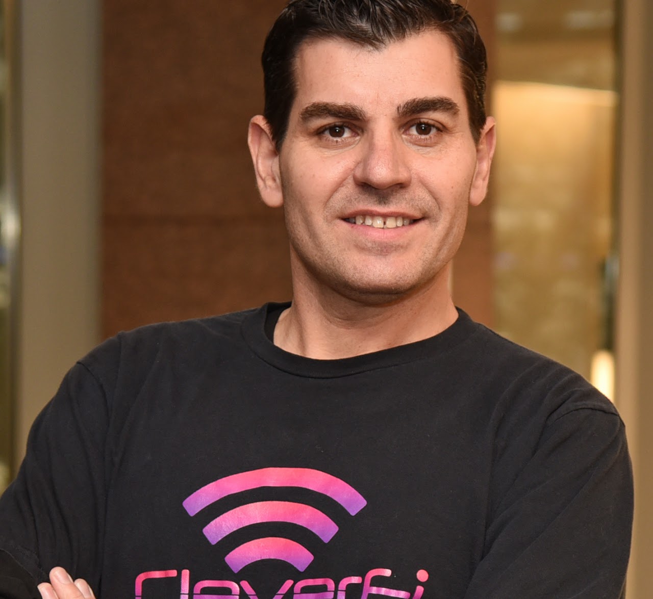 Portrait of Mario Soave wearing a CleverFi shirt